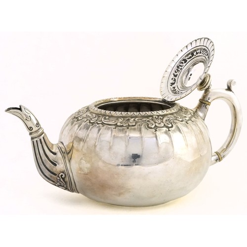 467 - James Dixon & Son Ltd., Edwardian silver pumpkin shaped teapot with embossed foliate decoration, She... 