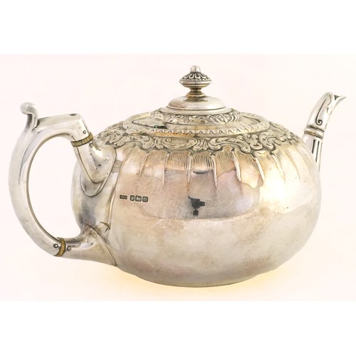 467 - James Dixon & Son Ltd., Edwardian silver pumpkin shaped teapot with embossed foliate decoration, She... 