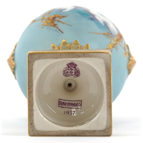 24 - Charles Baldwyn for Royal Worcester, early 20th century twin handled baluster vase and cover hand pa... 