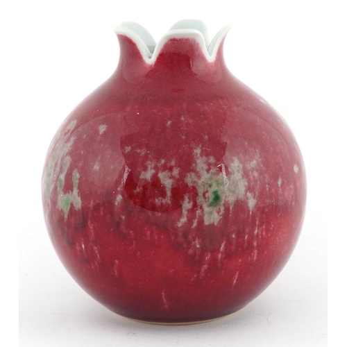 59 - Chinese porcelain pomegranate vase having a sang de boeuf glaze, six figure character marks to the b... 
