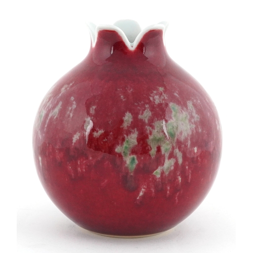 59 - Chinese porcelain pomegranate vase having a sang de boeuf glaze, six figure character marks to the b... 