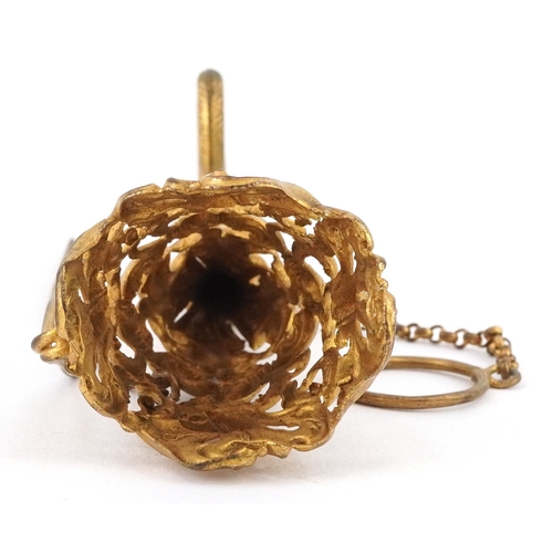 42 - 19th century gilt Tussie Mussie posy holder pierced with birds and foliage, 10cm wide.