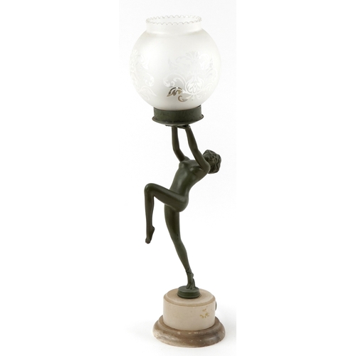 Art Deco patinated spelter table lamp in the form of a nude female, with glass shade, raised on an alabaster base, 51cm high.