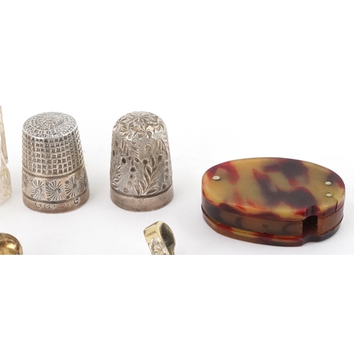 49 - Antique and later sundry items including a rosewater sprinkler, bobbin winder, silver thimbles and a... 