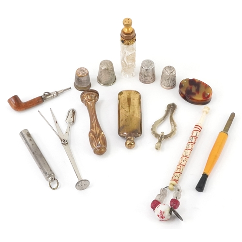 49 - Antique and later sundry items including a rosewater sprinkler, bobbin winder, silver thimbles and a... 