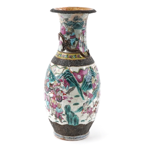 56 - Large Chinese porcelain vase hand painted with warriors and relief decorated with a dragon, 61cm hig... 