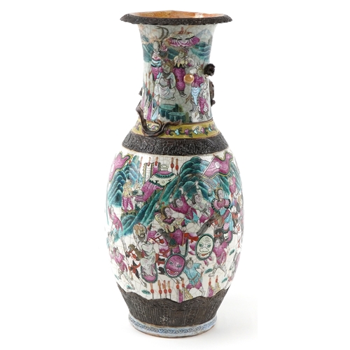 56 - Large Chinese porcelain vase hand painted with warriors and relief decorated with a dragon, 61cm hig... 