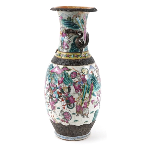 56 - Large Chinese porcelain vase hand painted with warriors and relief decorated with a dragon, 61cm hig... 