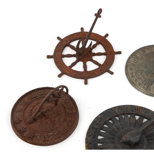 39 - Six Victorian cast iron and other metal sundials, two inscribed Grow Old Along With Me, The Best is ... 