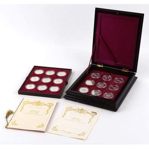 Queen Elizabeth II 1993 limited edition 40th Anniversary Coronation eighteen silver proof coin collection, each coin representing a country within the Commonwealth with booklet and certificate of authenticity, housed in a high quality African walnut wooden box, limited edition number of set 1673, total weight of silver 533.0g,