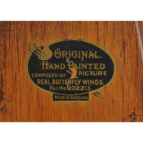 52 - Dorothy Buckley, early 20th century butterfly wing and hand painted silhouette of a mill and tree li... 