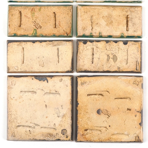 22 - Carter & Co., eighteen early 20th century Poole pottery maritime interest tiles - three levels of th... 