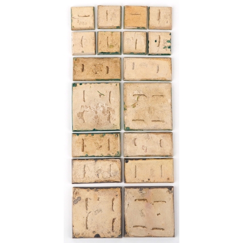 23 - Carter & Co., eighteen early 20th century Poole pottery maritime interest tiles - three levels of th... 