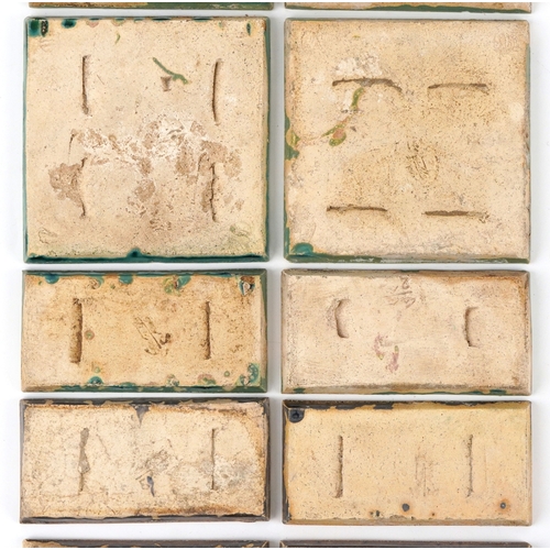 23 - Carter & Co., eighteen early 20th century Poole pottery maritime interest tiles - three levels of th... 