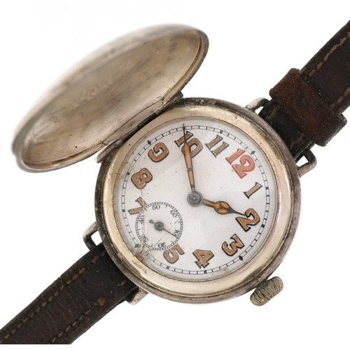 British military interest gentlemen's silver full hunter trench watch having enamelled dial with Arabic numerals, 34mm in diameter.