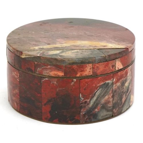 Rouge marble veneered bijou box & cover veneered in geometric sections, gilt bronze interior, diameter 9cm.