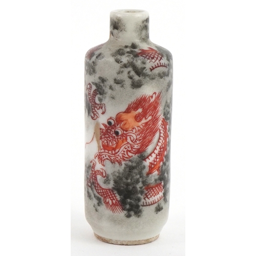 2517 - Chinese porcelain scent bottle hand painted in iron red with a dragon chasing a flaming pearl, 9cm h... 