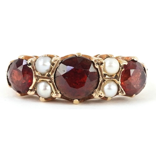 Antique 9ct gold garnet and seed pearl ring, size O, 3.5g.