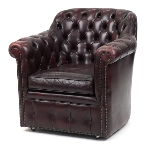 Burgundy leather Chesterfield button back tub chair, 80cm H x 80cm W x 65cm D.