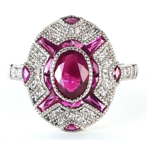 Art Deco style platinum ruby and diamond ring, total diamond weight 0.15 carat, total ruby weight 0.78 carat, size L, 3.6g.