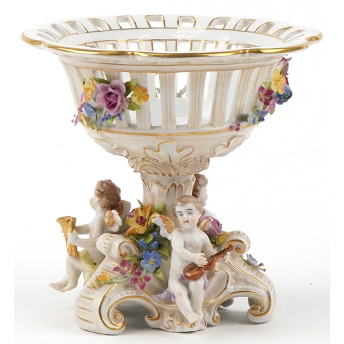 300 - Early 20th century Von Schierholz German porcelain tazza moulded with Putti and encrusted with flowe... 