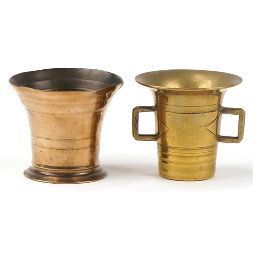 131 - Two antique bronze mortars, the largest 9cm high x 10cm in diameter.
