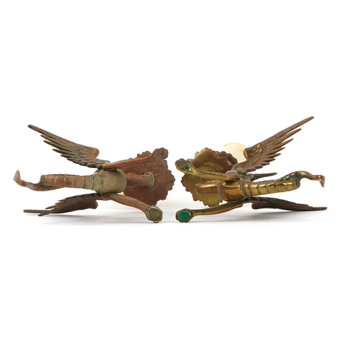 363 - Pair of Victorian gothic winged dragon brass candlesticks converted for electrical use, 25cm high.