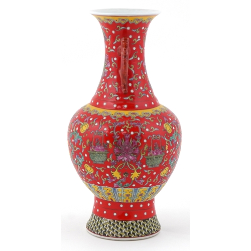 53 - Chinese baluster vase hand painted in the famille rose palette having animalia handles and enamelled... 