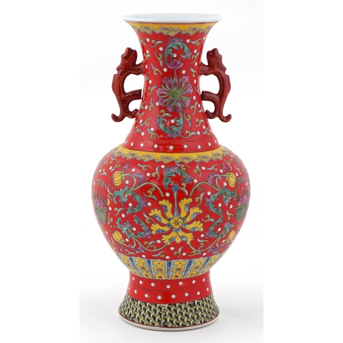 53 - Chinese baluster vase hand painted in the famille rose palette having animalia handles and enamelled... 
