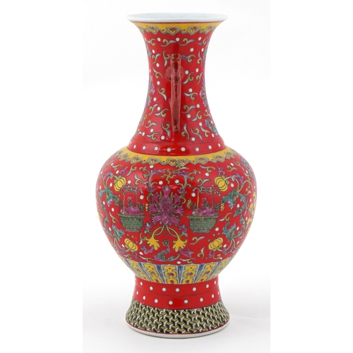 53 - Chinese baluster vase hand painted in the famille rose palette having animalia handles and enamelled... 