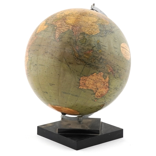 353 - George Philip & Son twelve inch terrestrial globe raised on a plinth base, 34cm high.