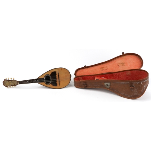 Antique inlaid rosewood mandolin bearing a Domenico Zanoni paper label to the interior, housed in a tan leather case, 60cm in length.