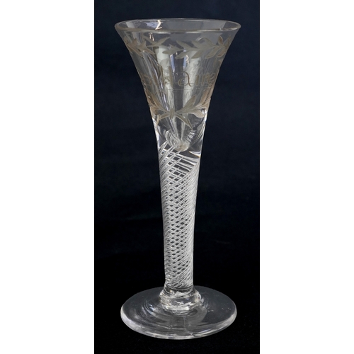 18th century cordial glass with air twist stem and engraved decoration, inscribed Capillaire, 14cm high.