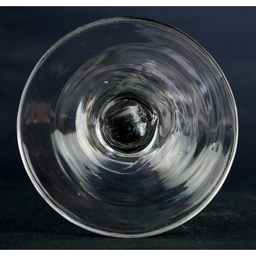 107 - 18th century Jacobite wine glass engraved with rosebuds and an insect, 15cm high.