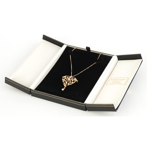 3016 - Edwardian 18ct gold seed pearl openwork brooch pendant on a 9ct gold necklace, 1.7cm high and 44cm i... 