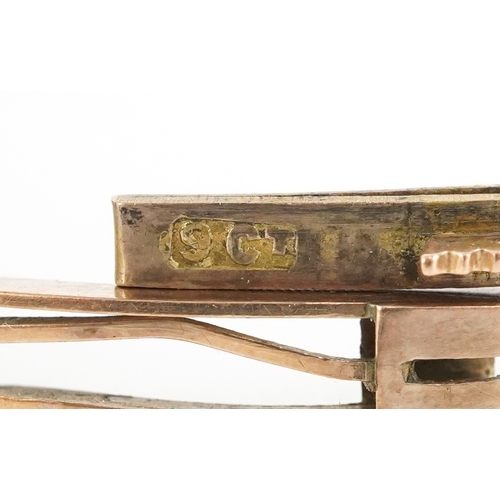 3042 - Edwardian 9ct gold ruby and diamond bangle, 6cm wide, 7.8g.