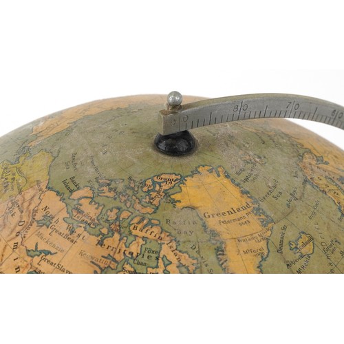 353 - George Philip & Son twelve inch terrestrial globe raised on a plinth base, 34cm high.