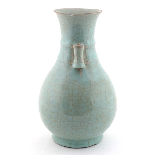 58 - Chinese porcelain crackle glazed celadon vase having ears, 24cm high.