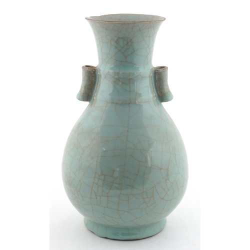 58 - Chinese porcelain crackle glazed celadon vase having ears, 24cm high.