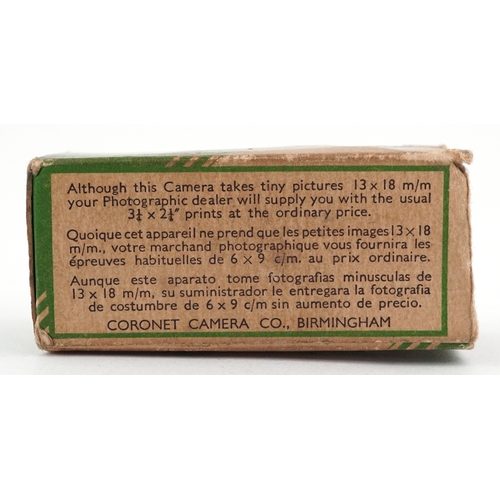 1263 - Coronet Midget Sub-Miniature camera in mottled green Bakelite, 7cm high, with box.