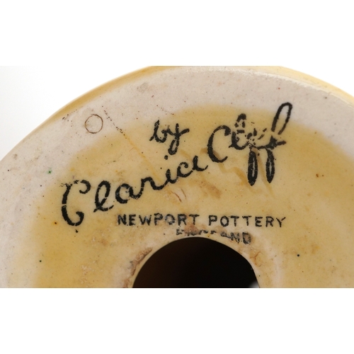 152 - Clarice Cliff, Art Deco pottery comprising a teacup hand painted in the Gayday pattern, a salt shake... 