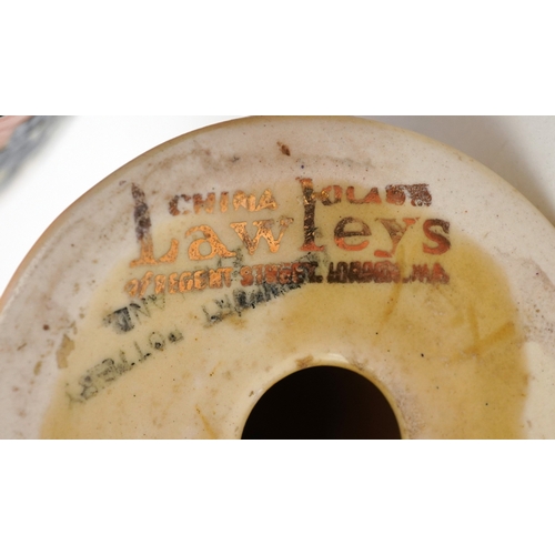 152 - Clarice Cliff, Art Deco pottery comprising a teacup hand painted in the Gayday pattern, a salt shake... 