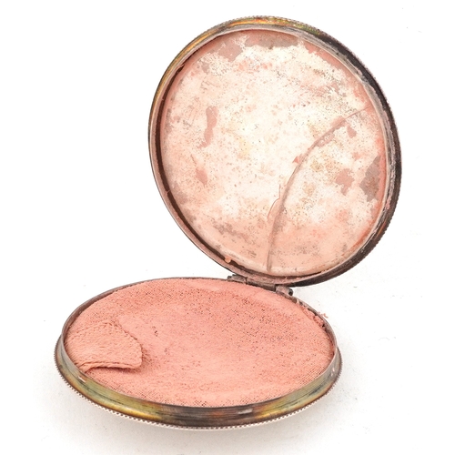 549 - Vintage 835 grade silver compact engraved with a camel, 6.5cm in diameter, total 36.5g.