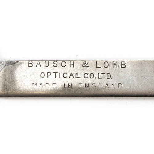 132 - Early 20th century optometrist's lens and tool set including a Bausch & Lomb optical lens gauge and ... 