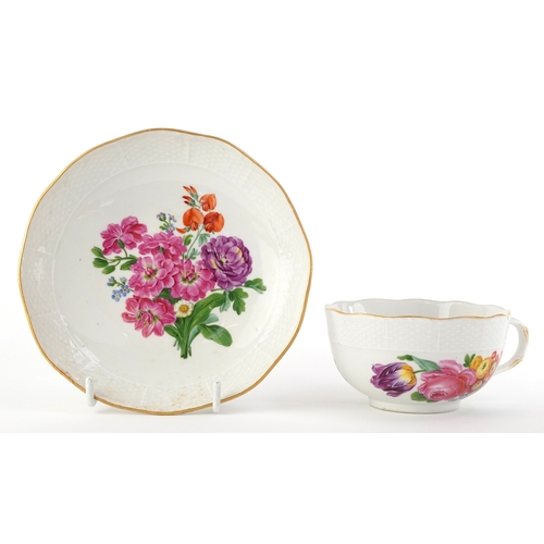 307 - 19th century Meissen porcelain teacup and saucer hand painted with floral sprays having moulded bask... 