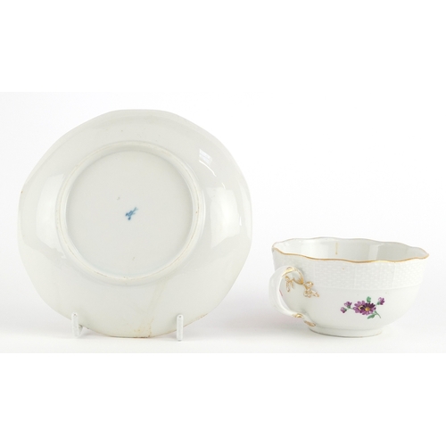 307 - 19th century Meissen porcelain teacup and saucer hand painted with floral sprays having moulded bask... 