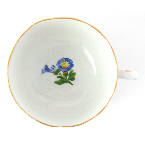 307 - 19th century Meissen porcelain teacup and saucer hand painted with floral sprays having moulded bask... 
