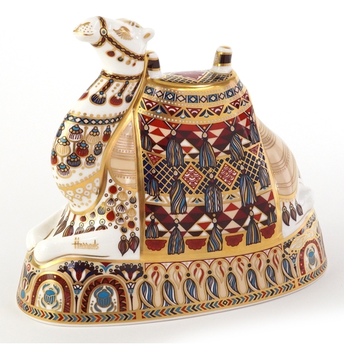 1007 - Royal Crown Derby Harrods Camel paperweight, gold coloured stopper to the base, 17cm high, boxed.