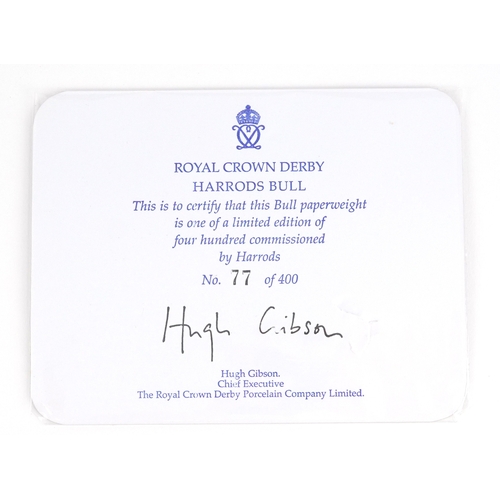 1003 - Royal Crown Derby Harrods Bull, editioned 77/400, gold coloured stopper to the base, 19cm wide, with... 