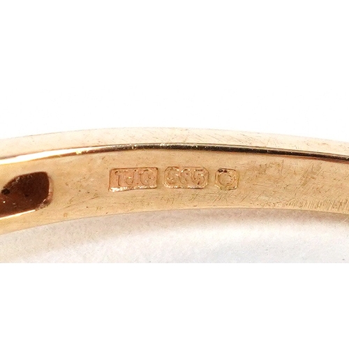 3015 - 14ct gold diamond and red stone ring, possibly fire opal, size R, 2.9g.